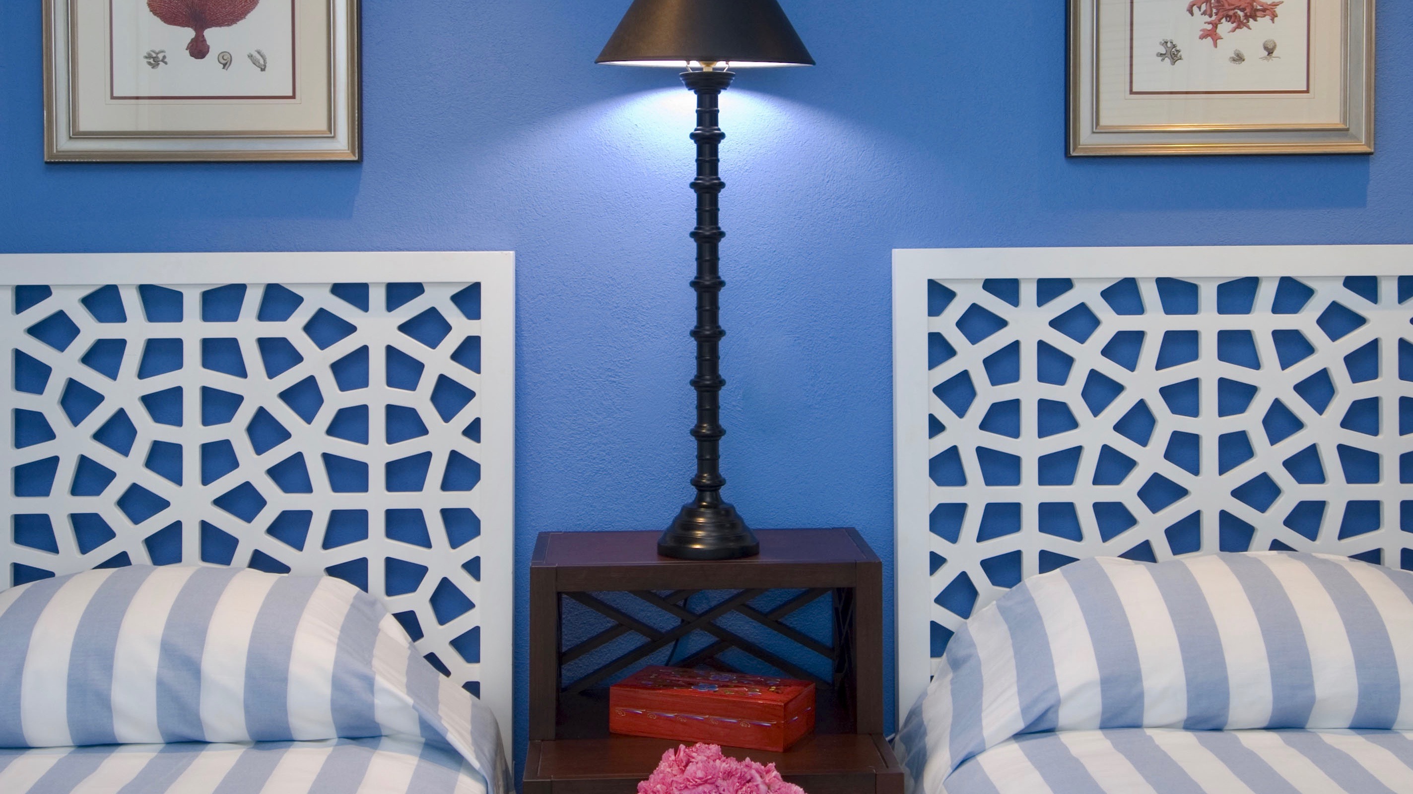 Trellis headboards and blue wall Jerry Jacobs Design